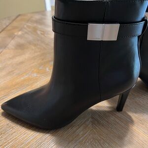 Calvin Klein Black Heeled Boots with Sleek Design